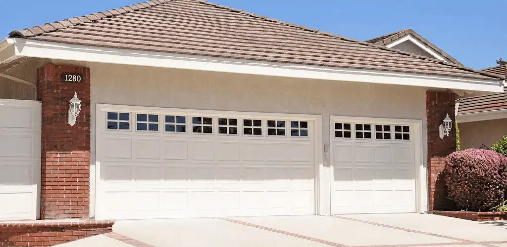 Residential garage door repair service for a double garage door in Madison, WI